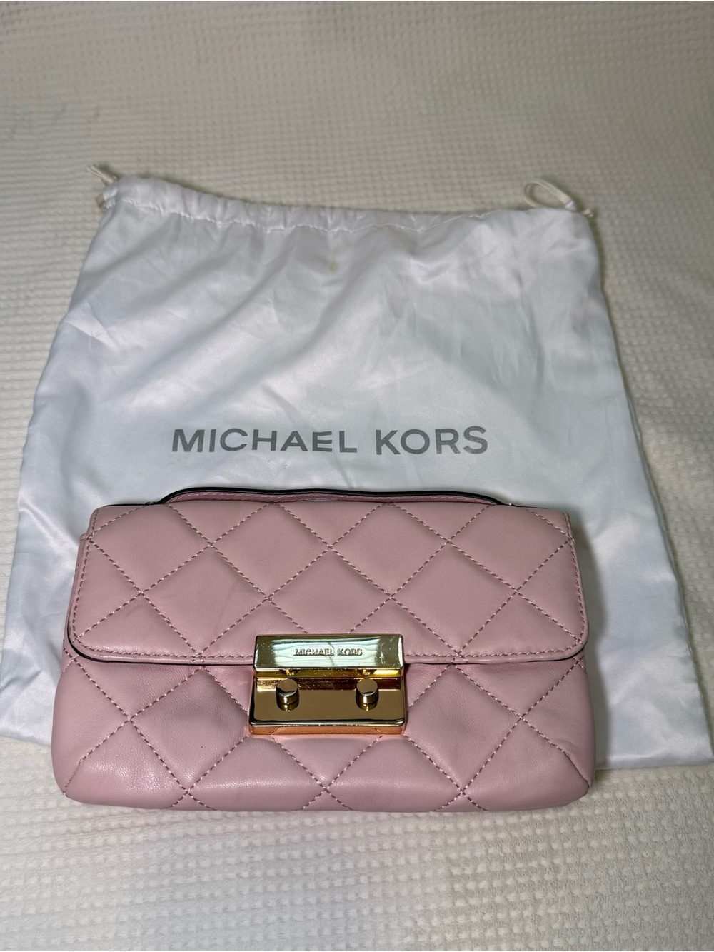 Michael Kors pink quilted leather crossbody bag with gold chain